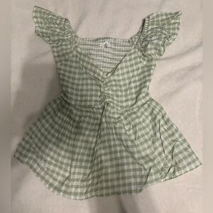 green checkered top